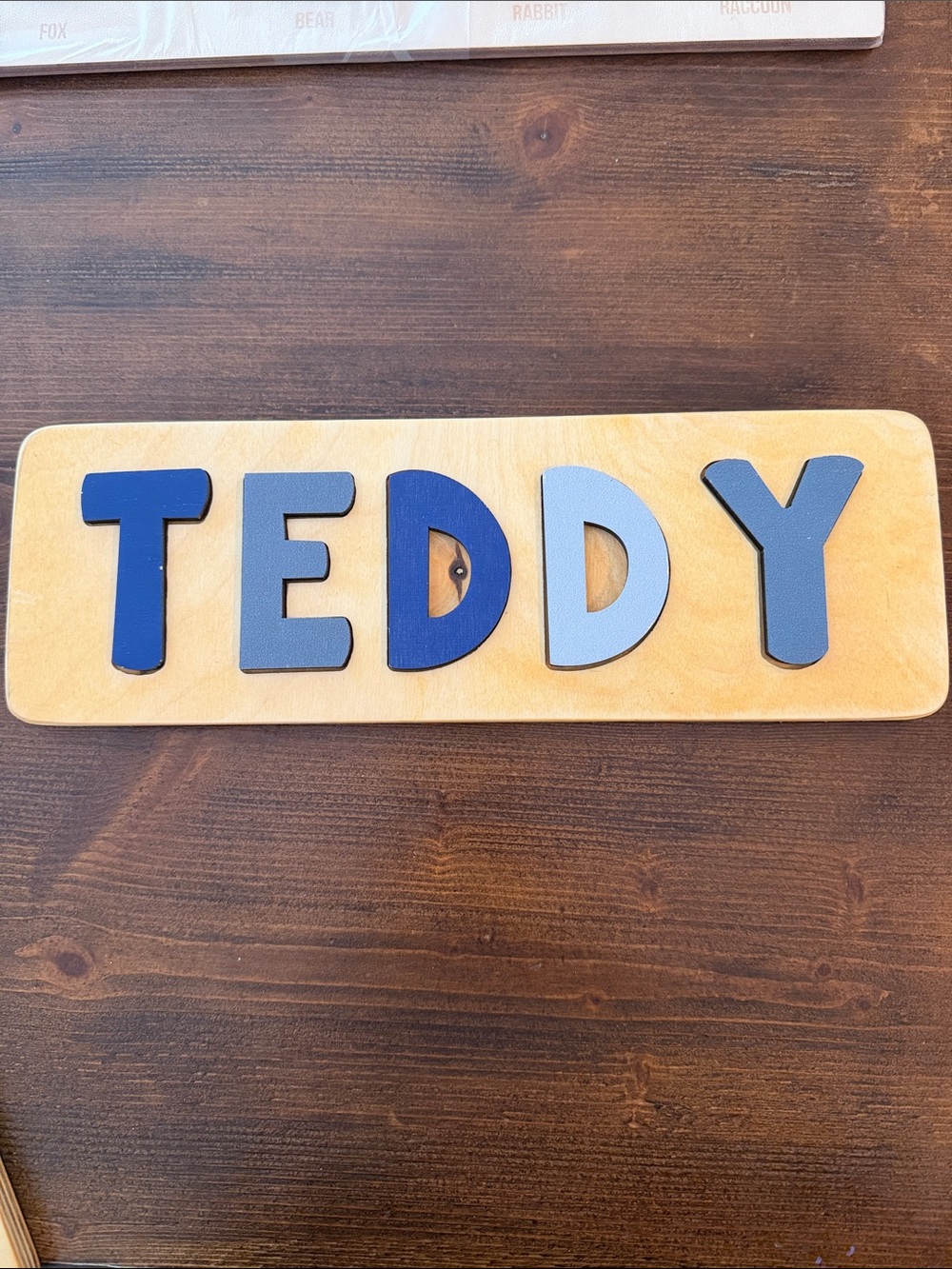 Wooden Name Puzzle 'TEDDY' - Blue Gradient Letters